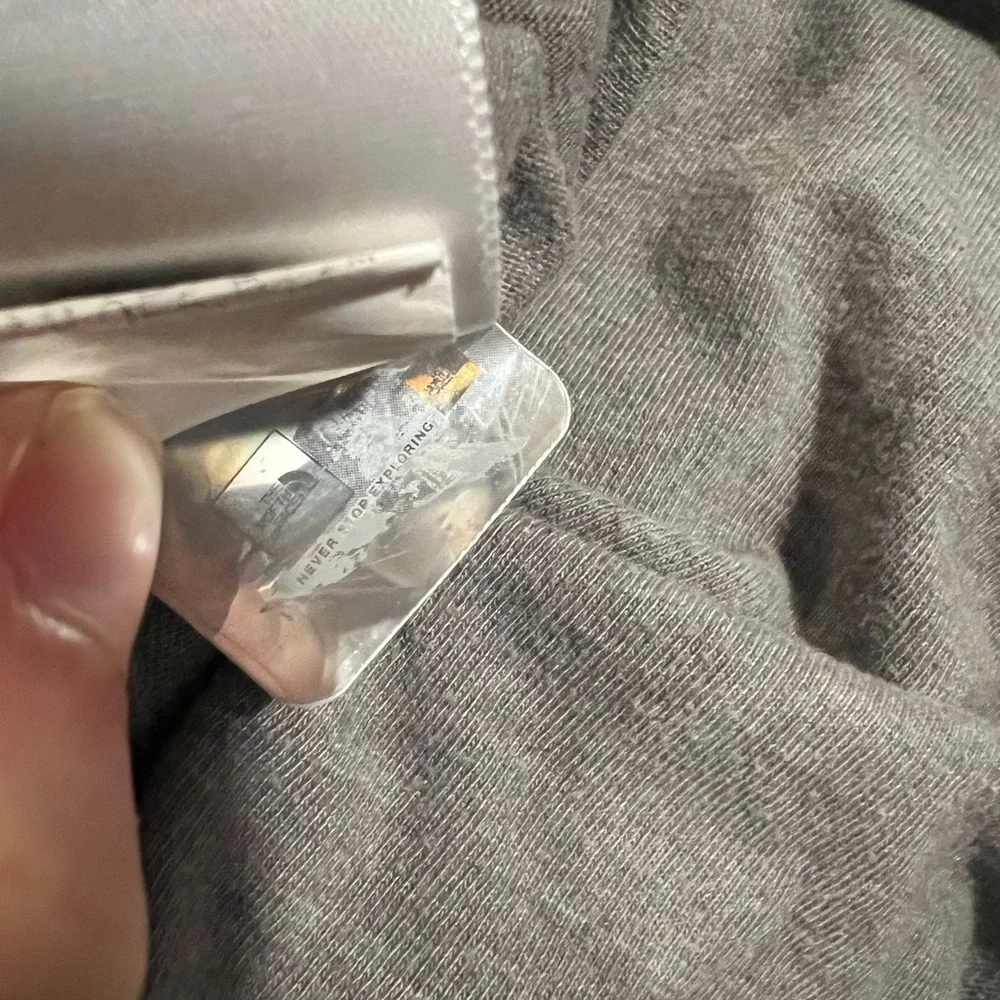 The North Face Gray Tee with Blue and Red Logo